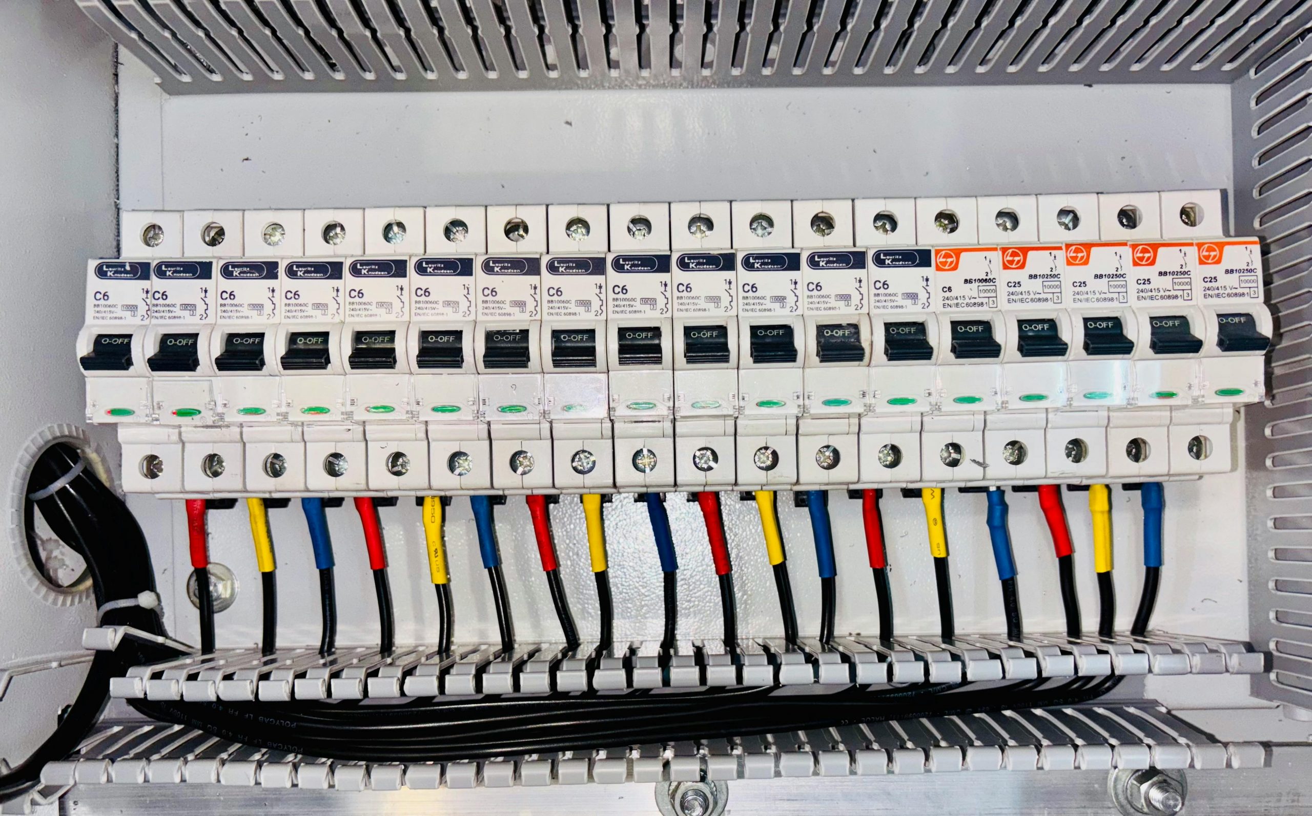 Electrical circuit breaker panel with color coded wiring